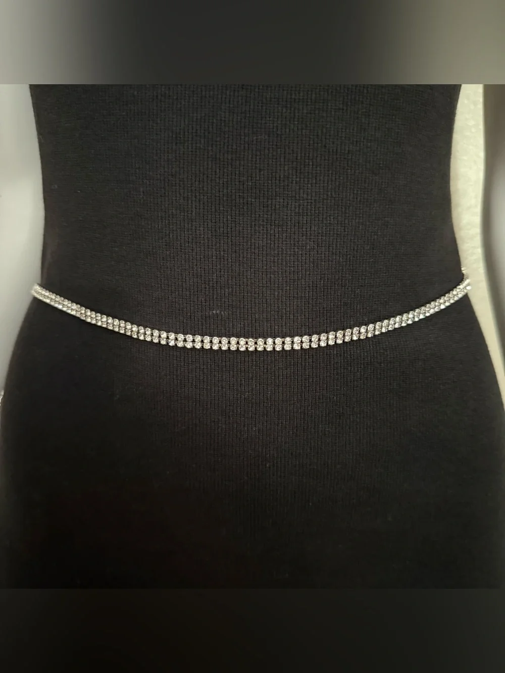 Silver tone metal skinny chain belt with rhinestone details